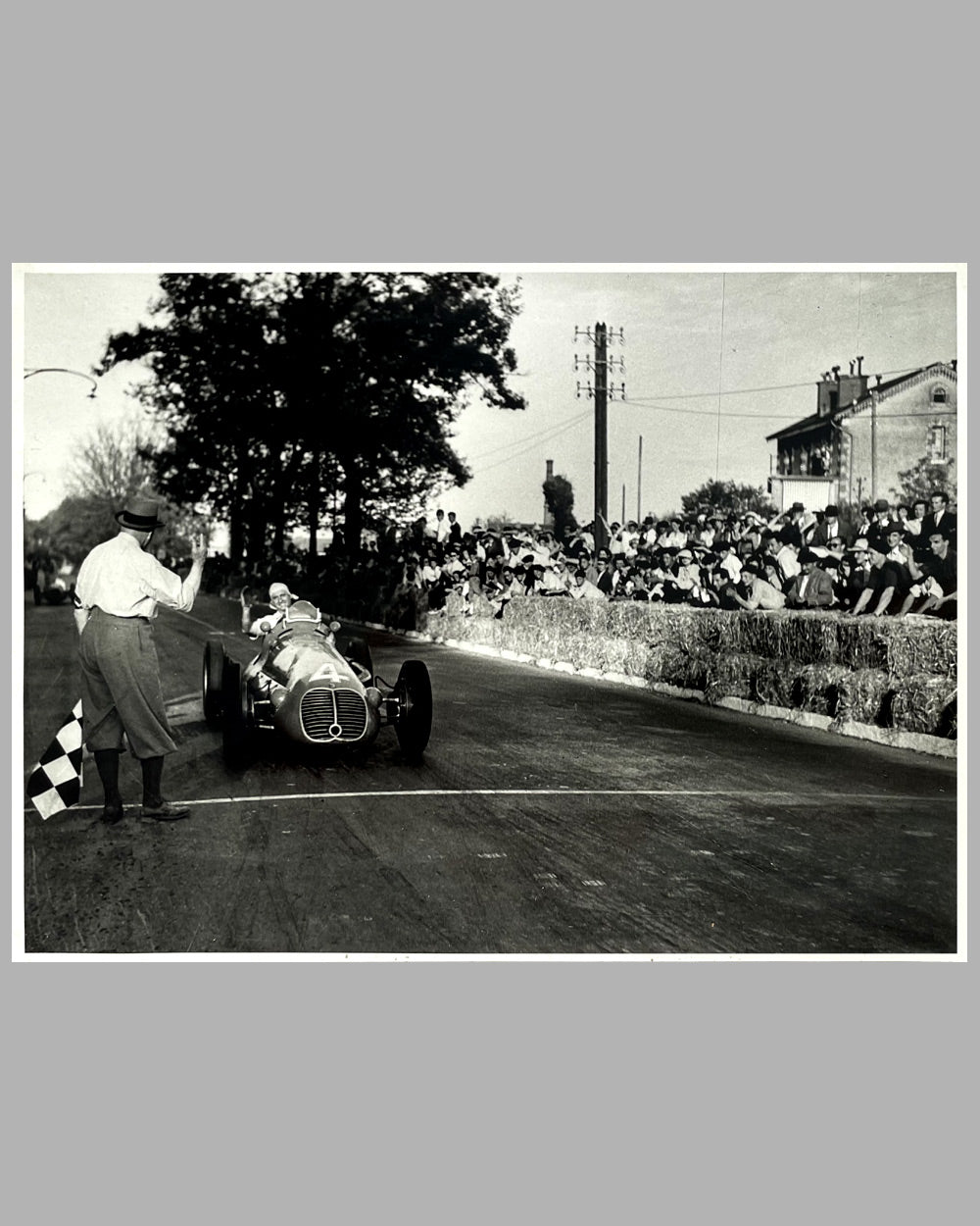 Juan Manuel Fangio b&w photograph by Jean Dieuzaide