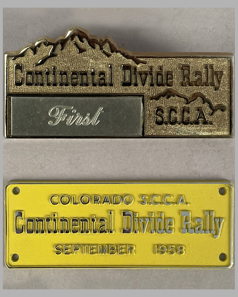 Two 1958 Continental Divide Rally dash plaques