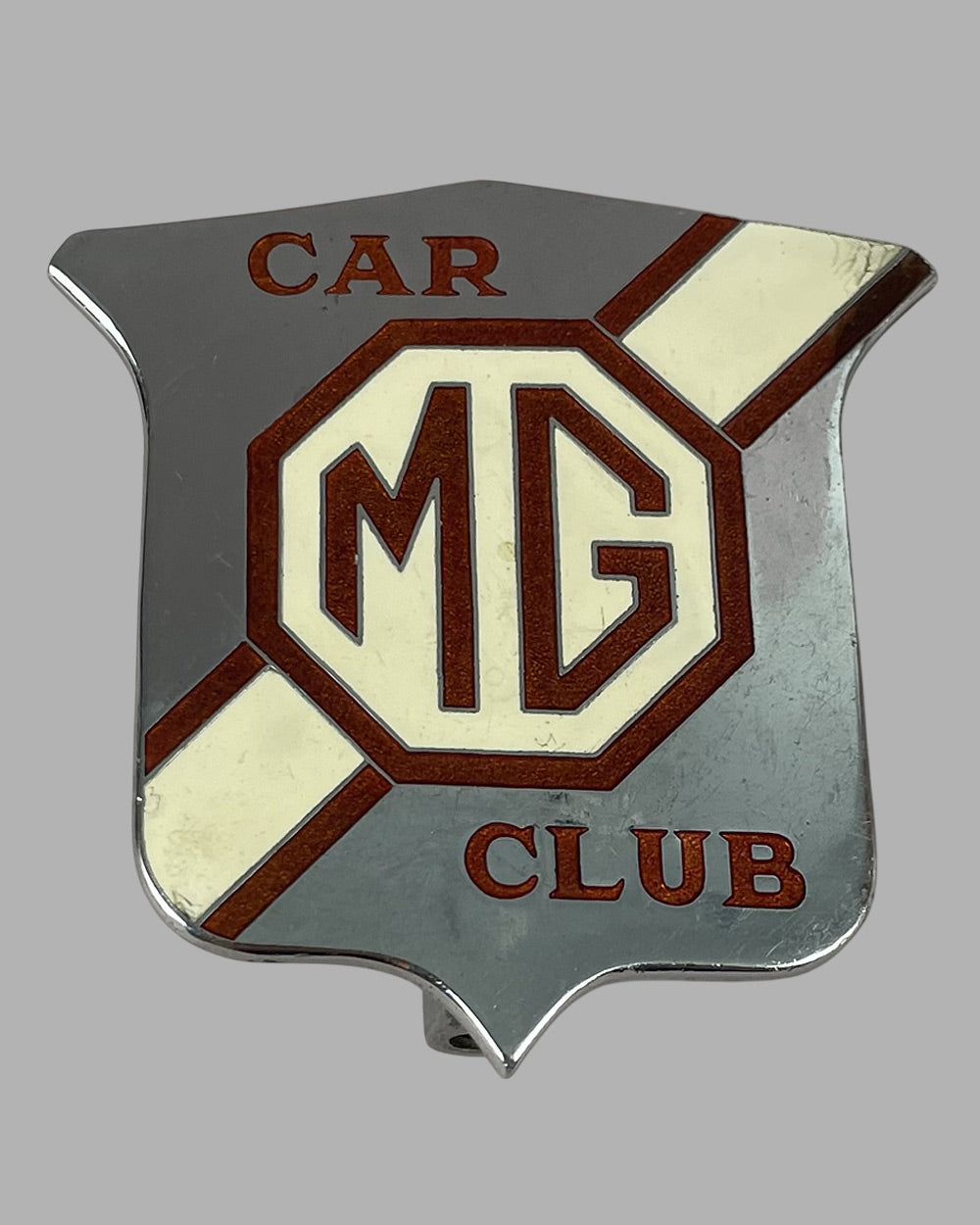 Collection of 9 various MG badges from the factory 6