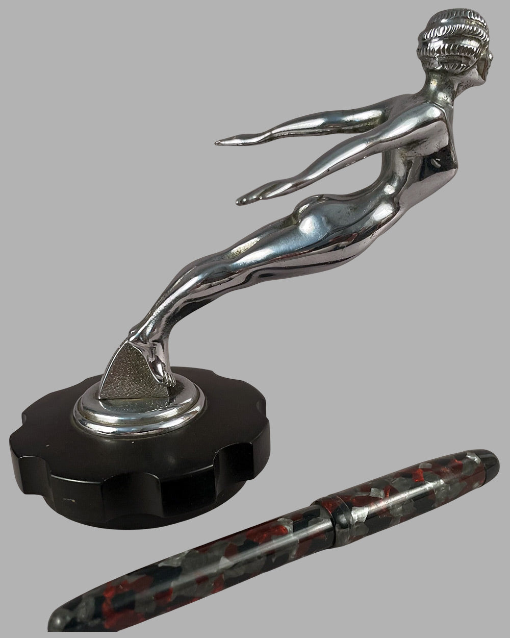 Diving nymph mascot by Desmo, signed