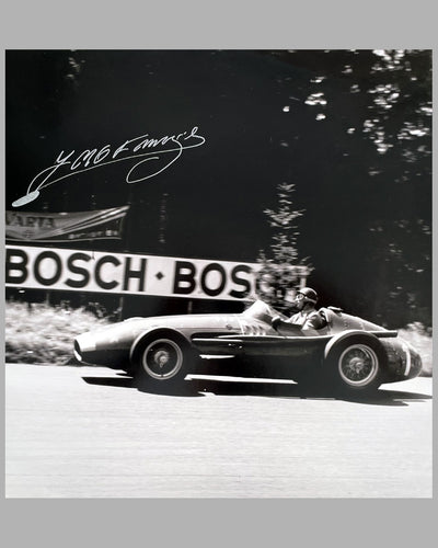 Fangio’s greatest victory autographed b&w photograph 2