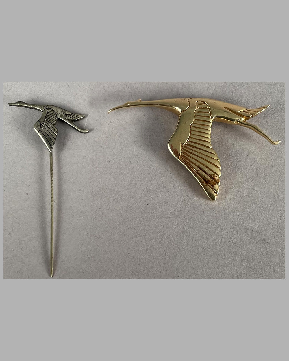 Two Hispano Suiza lapel pins