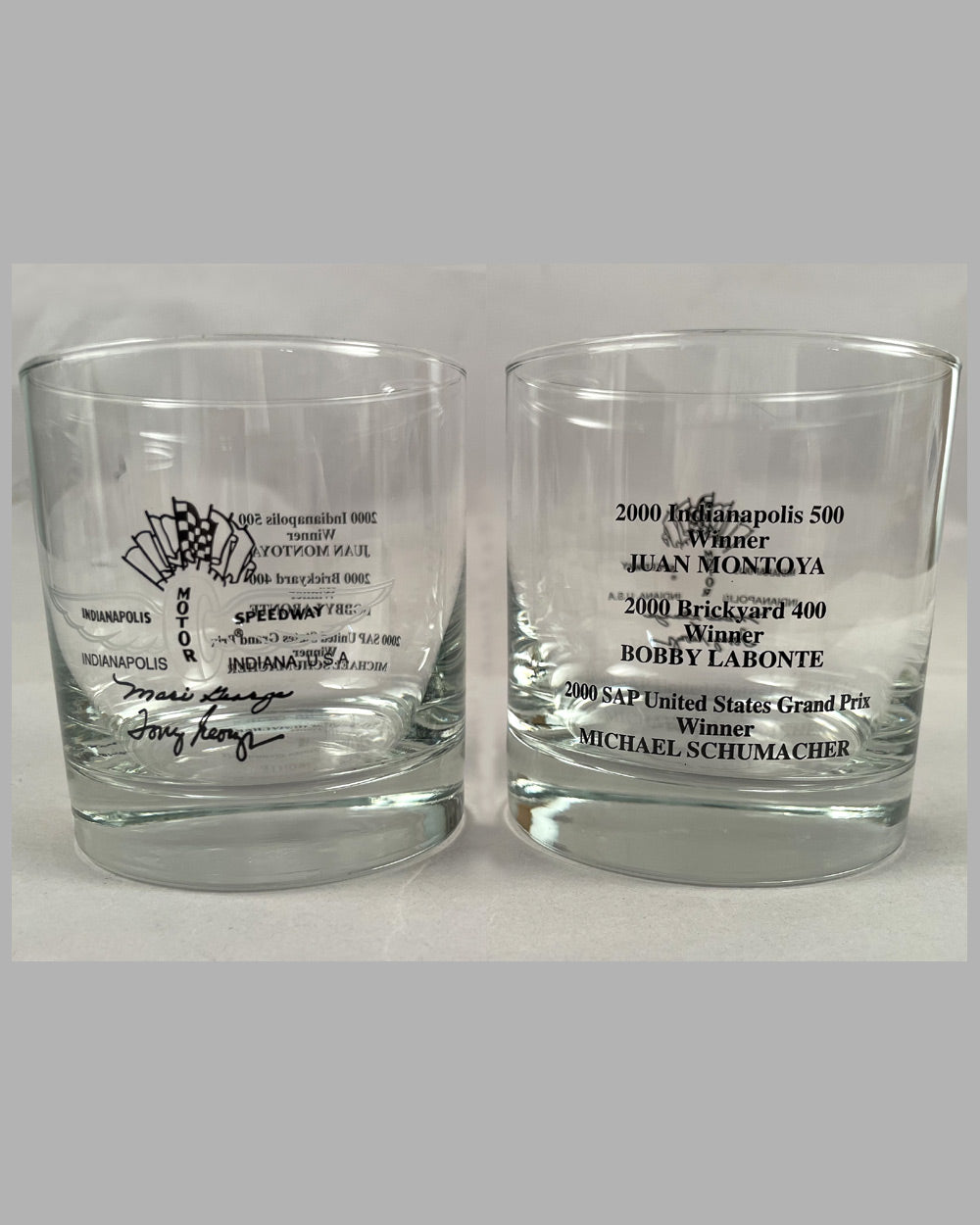 Set of Indianapolis Motor Speedway (IMS) whiskey glasses and decanter celebrating 3 wins in 2000 2
