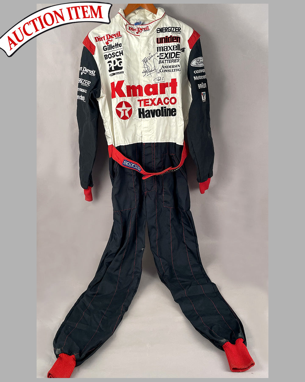 Nigel Mansell autographed crew suit by Sparco