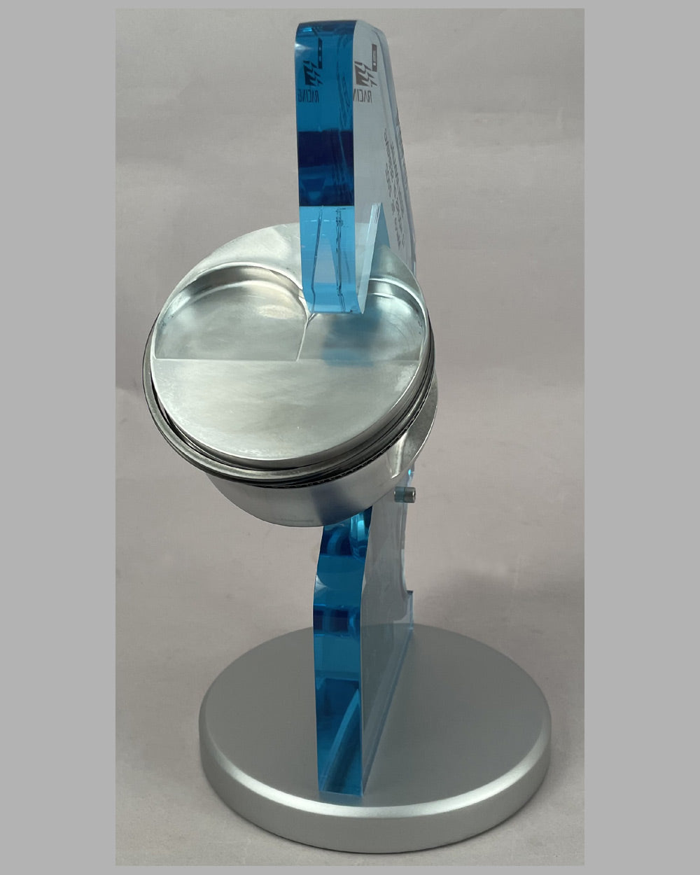 Piston and rod assembly from the Corvette C5R driven at the 50th 12 Hours of Sebring in 2002