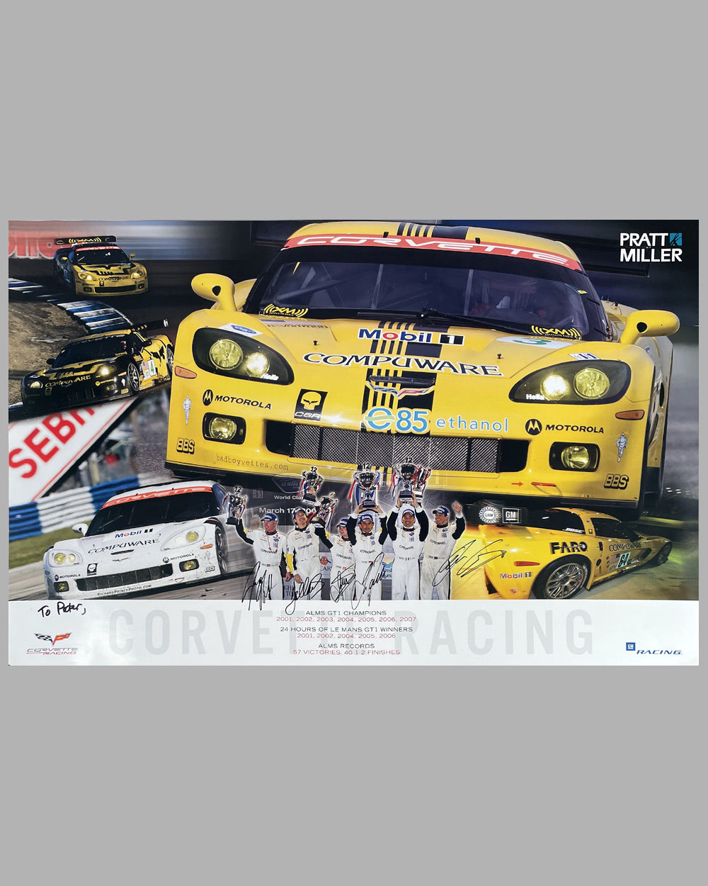Corvette Racing poster produced by G.M., autographed by 5 drivers