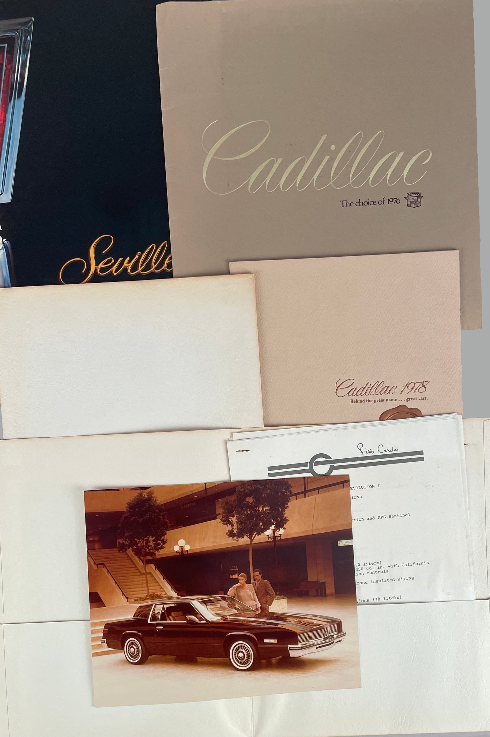 12  1970’s Cadillac factory sales brochures + 3 dealer brochures