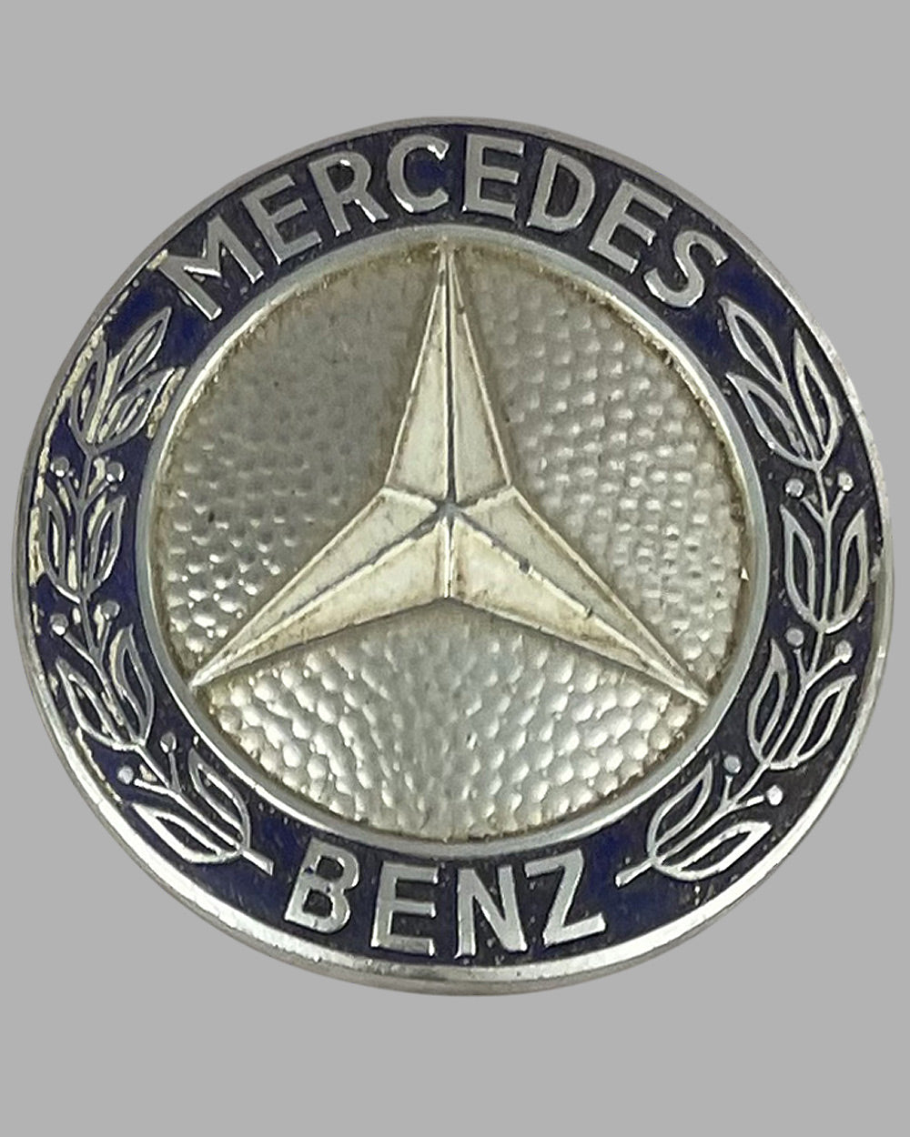 Two Mercedes badges 3
