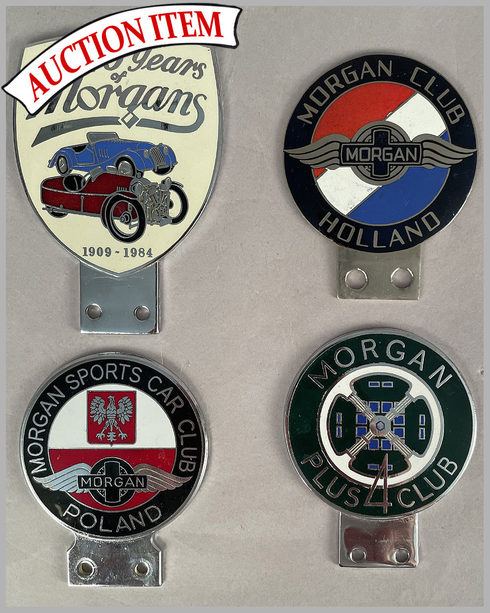 Four Morgan Club bumper or bar badges