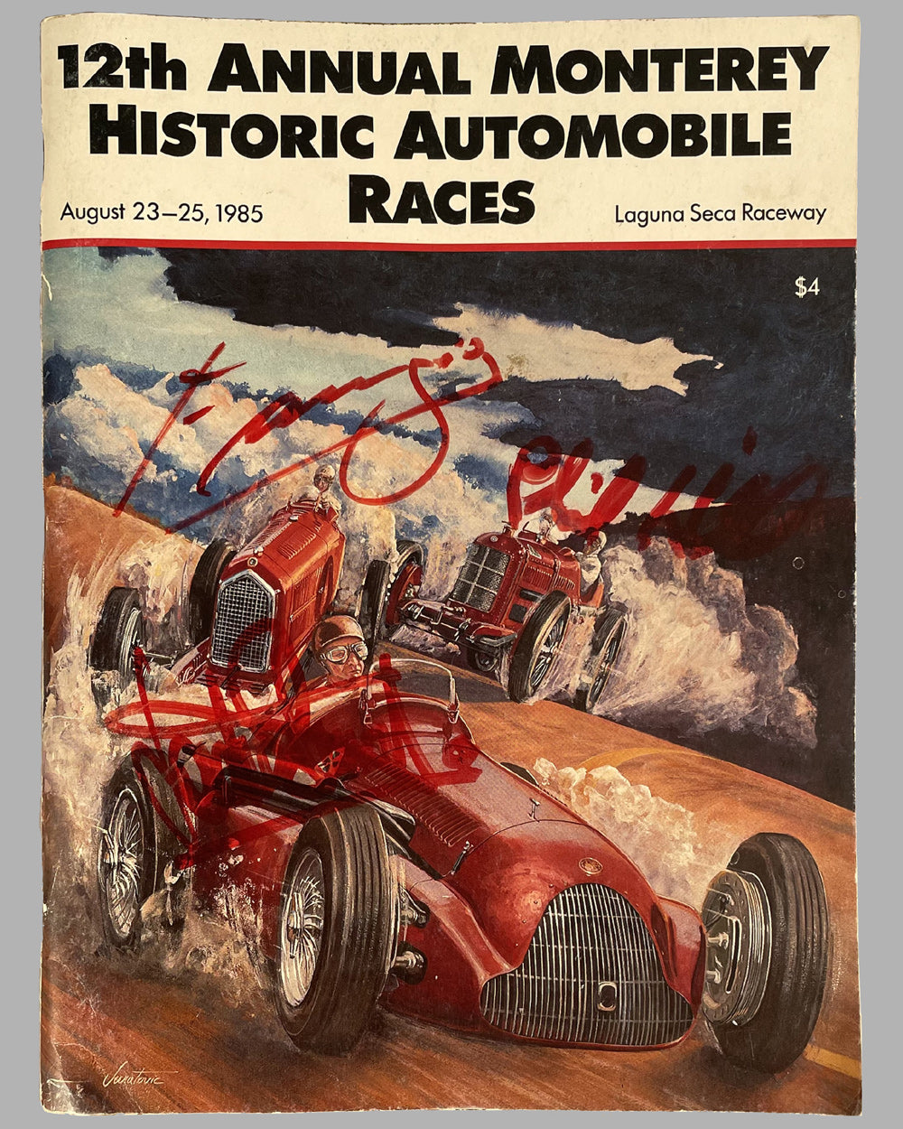 1985 Monterey Historic Automobile Races at Laguna Seca Raceway program, cover by Jack Juratovic, autographed