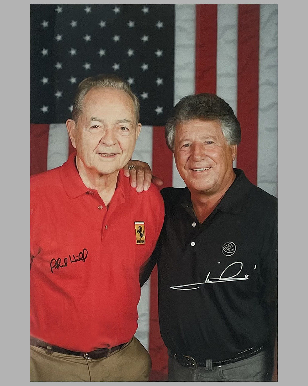 American World Champions color photograph by John Lamm, hand autographed by Phil Hill and Mario Andretti 2