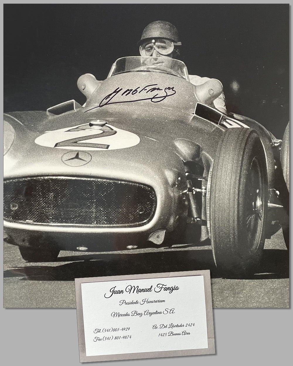 Juan Manuel Fangio at speed b&amp;w photograph, hand autographed by Fangio 2