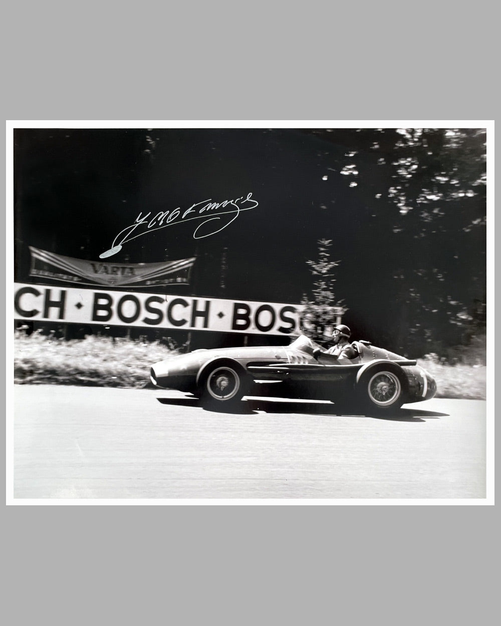 Fangio’s greatest victory autographed b&amp;w photograph