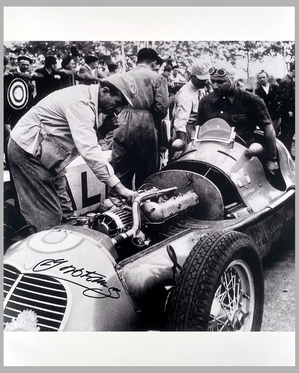 Fangio’s Maserati in the Pits b&amp;w photograph by Fernando Gomez, autographed by Fangio