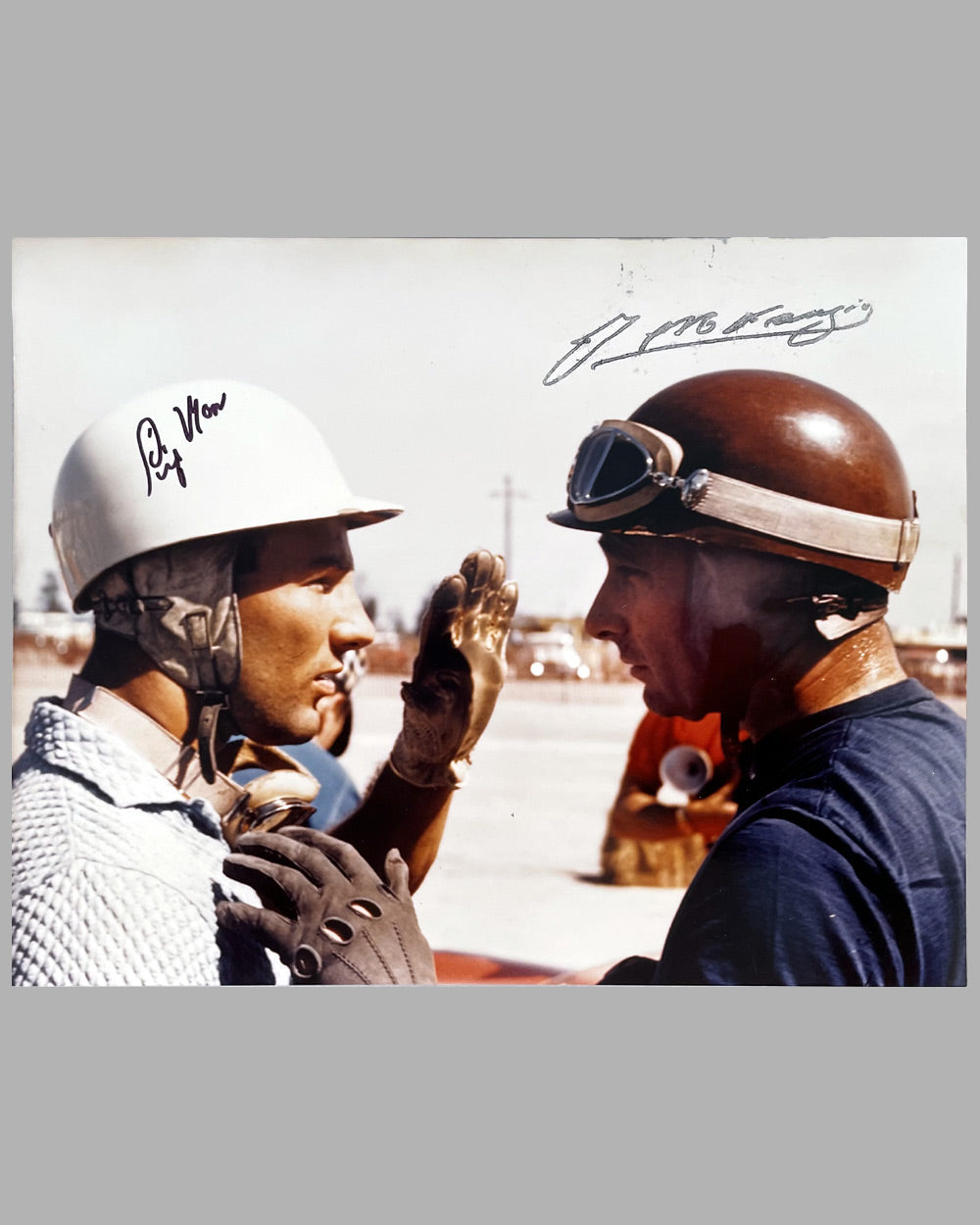 Juan Manuel Fangio and Stirling Moss hand autographed color photograph