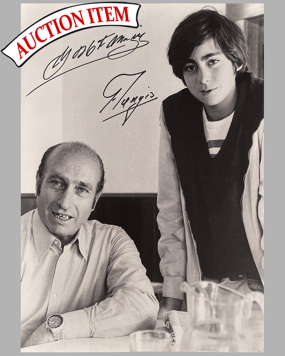 Juan Manuel Fangio with his nephew, Juan Manuel Fangio II b&amp;w photograph by Fernando Gomez, hand autographed by both