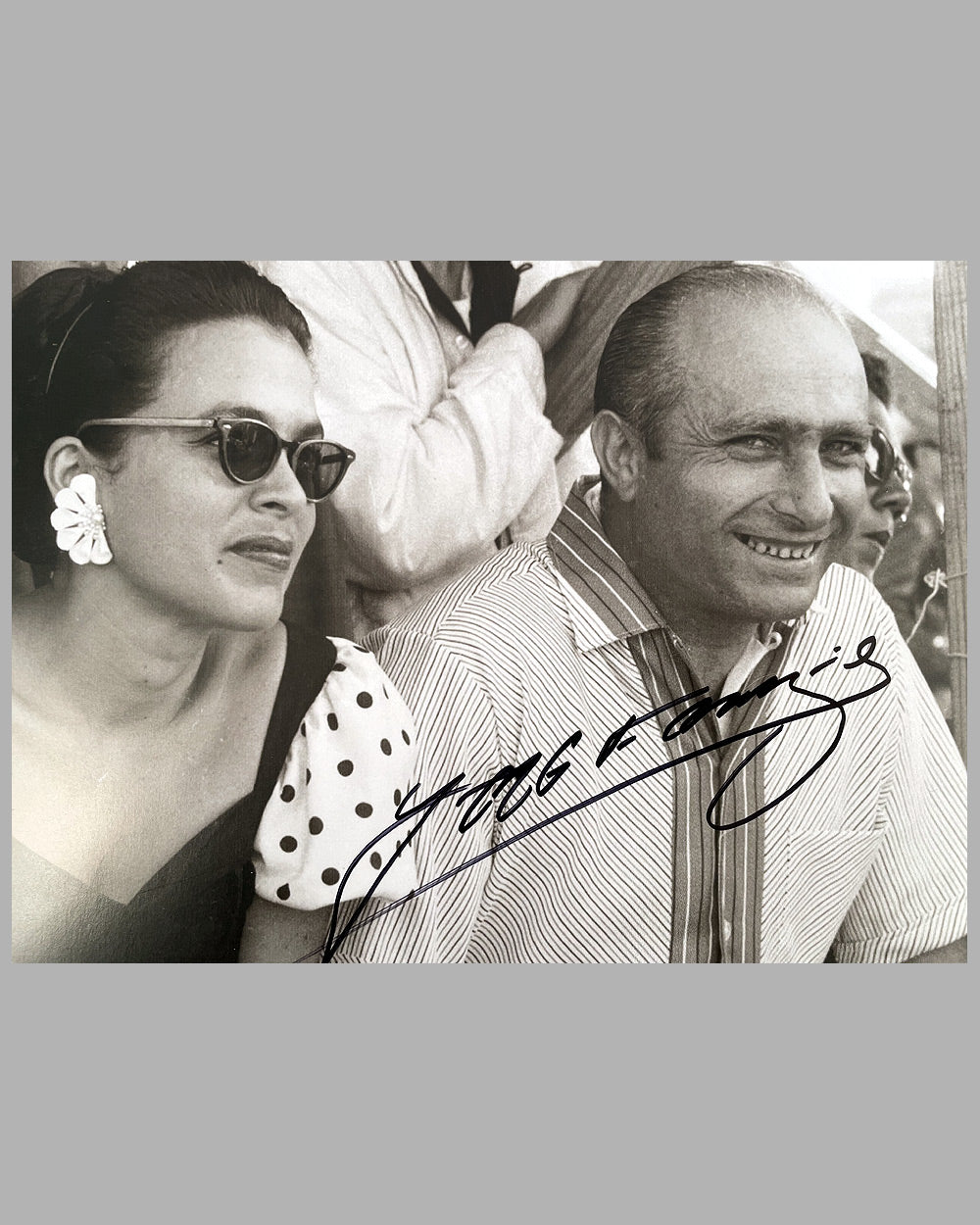Juan Manuel Fangio in good company on the pit wall b&w photo 2