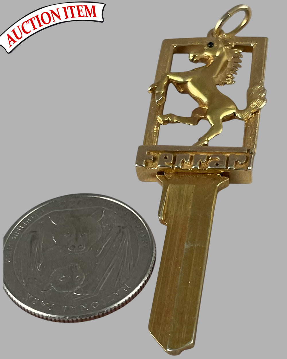 Gold Ferrari blank key neck pendent, 14k
