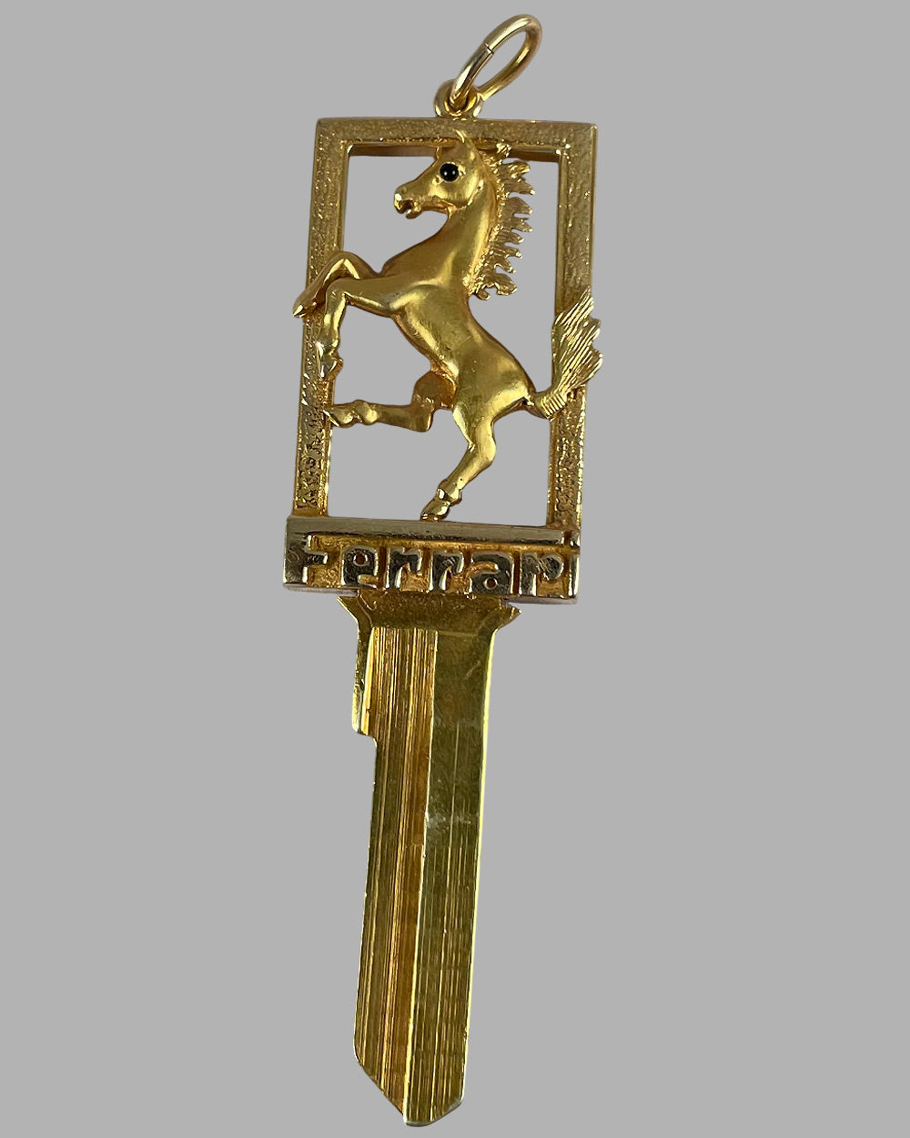 Gold Ferrari blank key neck pendent, 14k 2