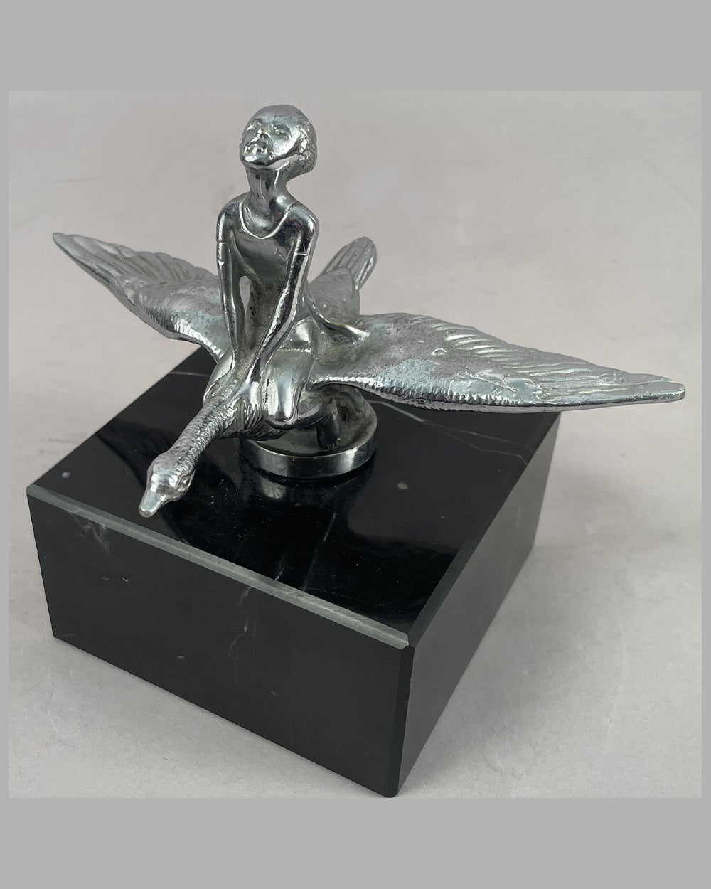 Young girl riding a goose mascot 2