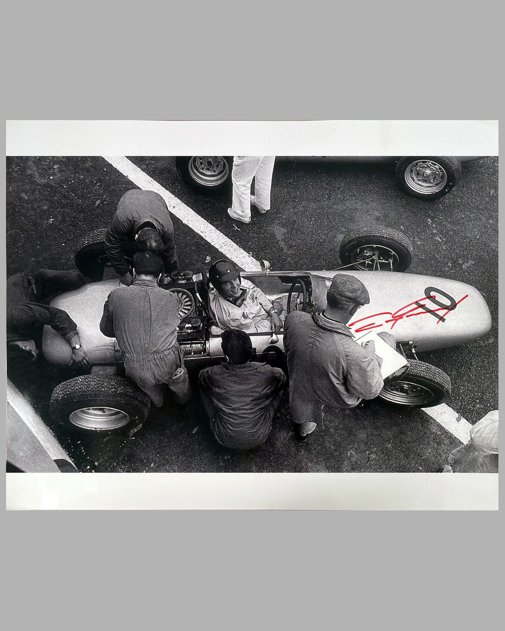 Dan Gurney in his Porsche Formula 1 car in Rouen in 1962 b&w photograph, autographed by Gurney