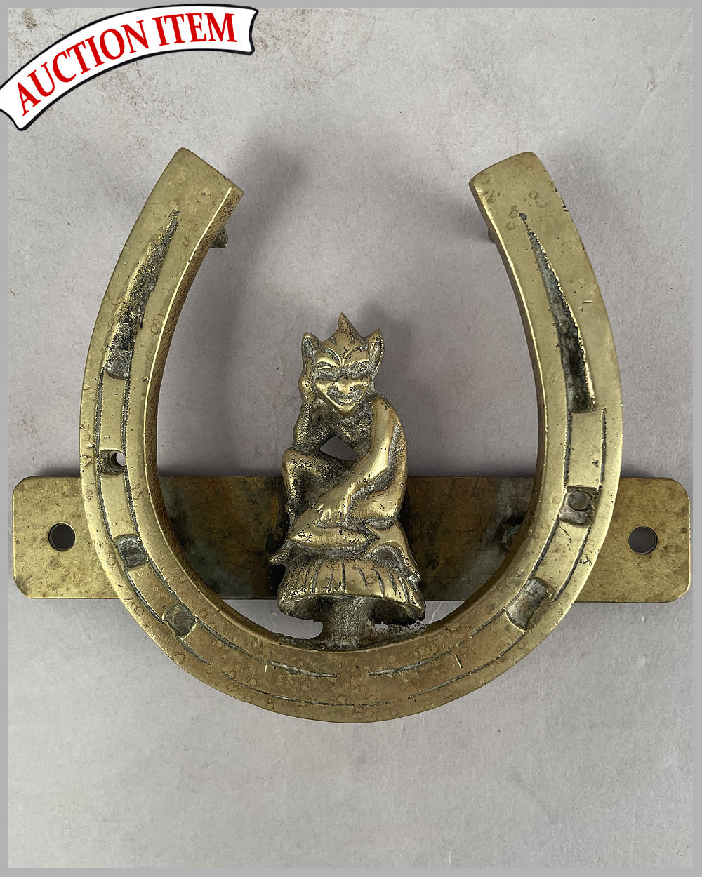Horseshoe and the devil radiator accessory badge