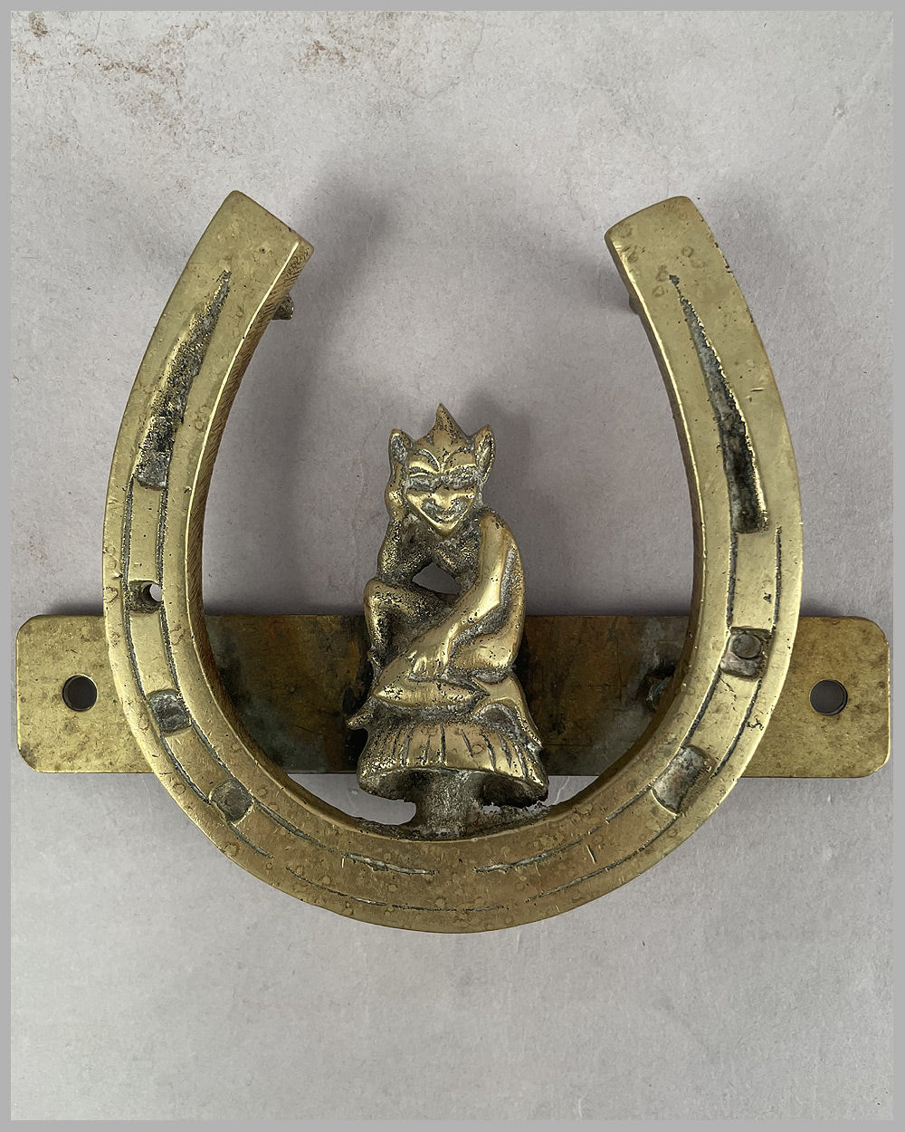 Horseshoe and the devil radiator accessory badge