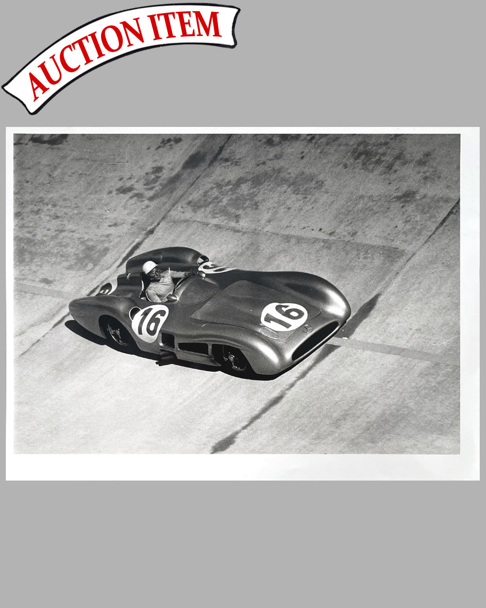 2 - Stirling Moss at speed 1955 b&w photograph