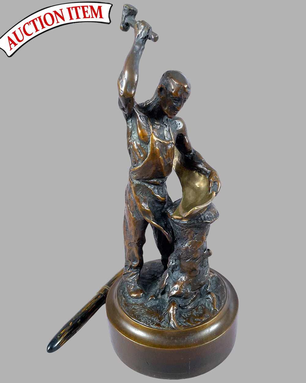 The Panel Beater bronze sculpture by Larry Braun, 1990