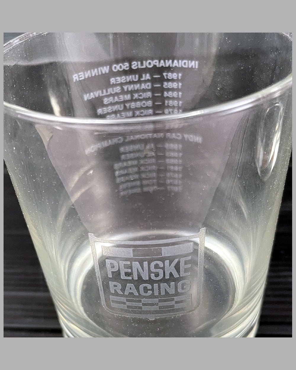 Four Penske racing cocktail glasses from 1987 2