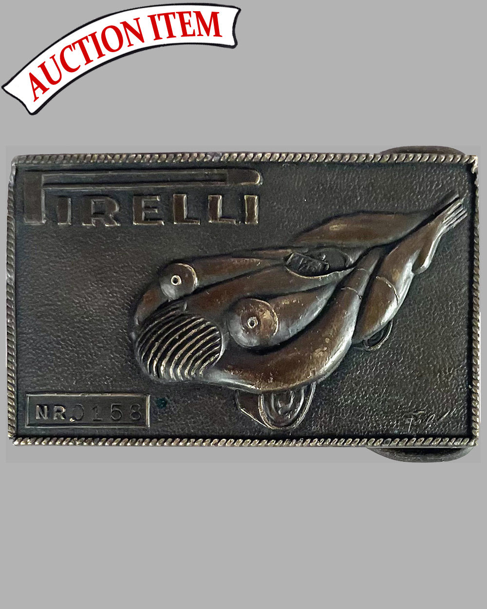 Pirelli belt buckle designed by Salvador Dali, ca. 1970