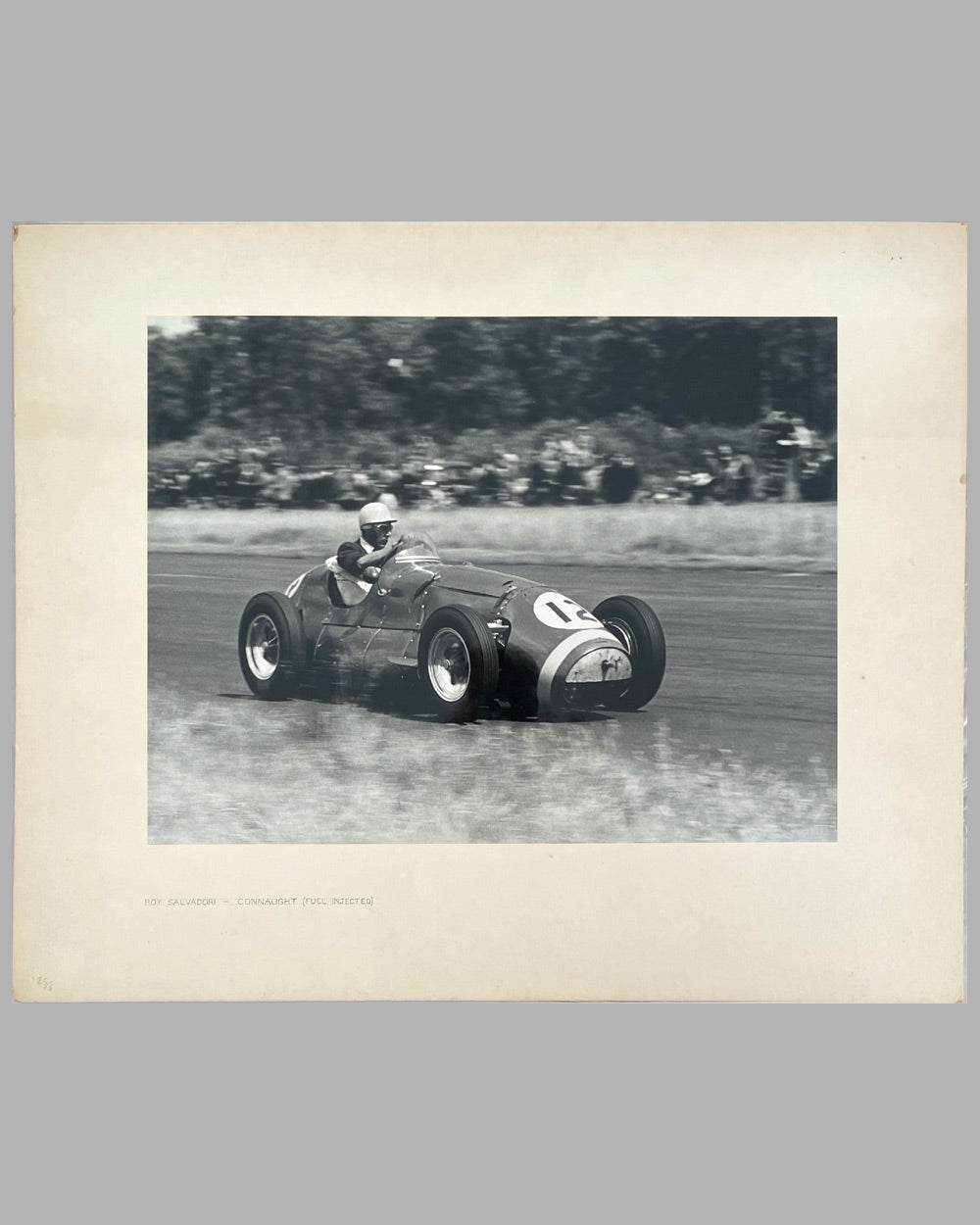 Roy Salvadori in his fuel injected Connaught Formula 1 car at speed b&amp;w photograph by T.C. March