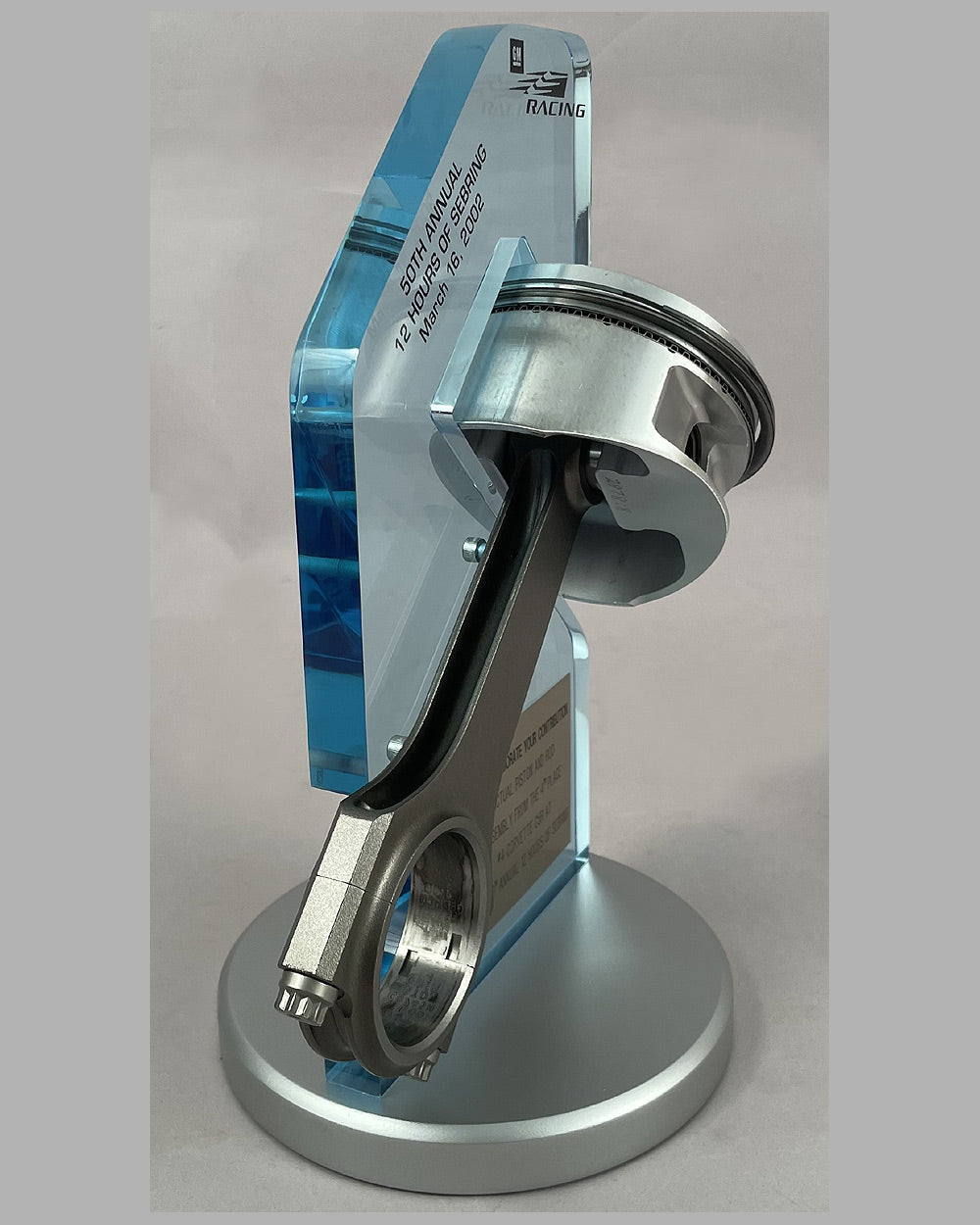 Piston and rod assembly from the Corvette C5R driven at the 50th 12 Hours of Sebring in 2002