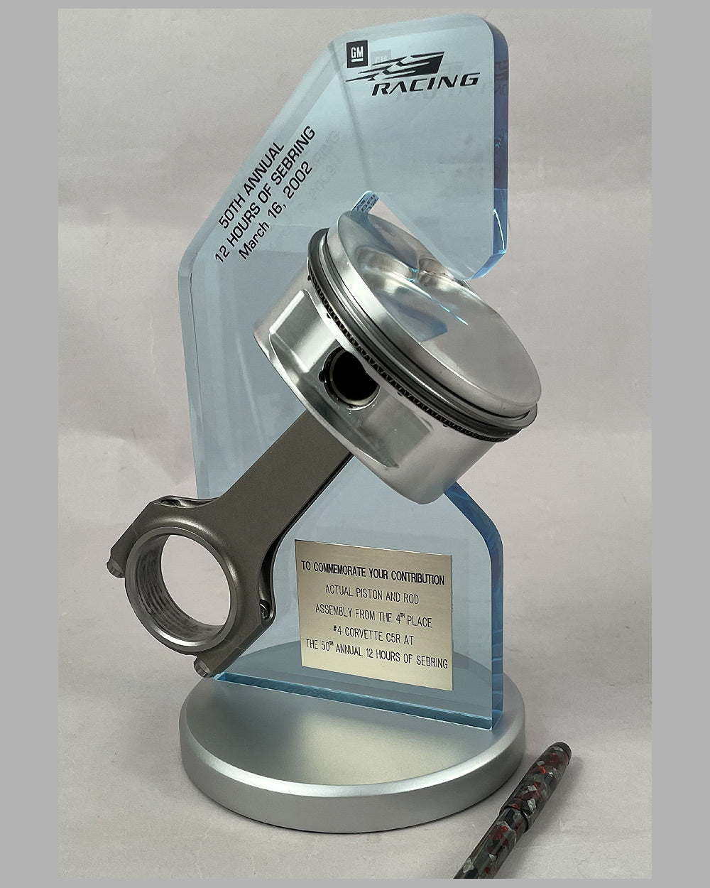 Piston and rod assembly from the Corvette C5R driven at the 50th 12 Hours of Sebring in 2002
