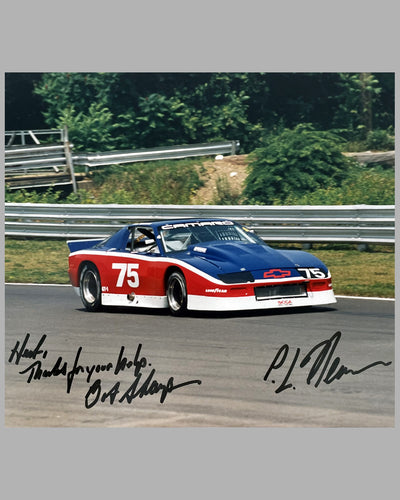 Unusual and rare color photograph of a Bob Sharp Chevrolet Camaro race car, autographed by Paul Newman