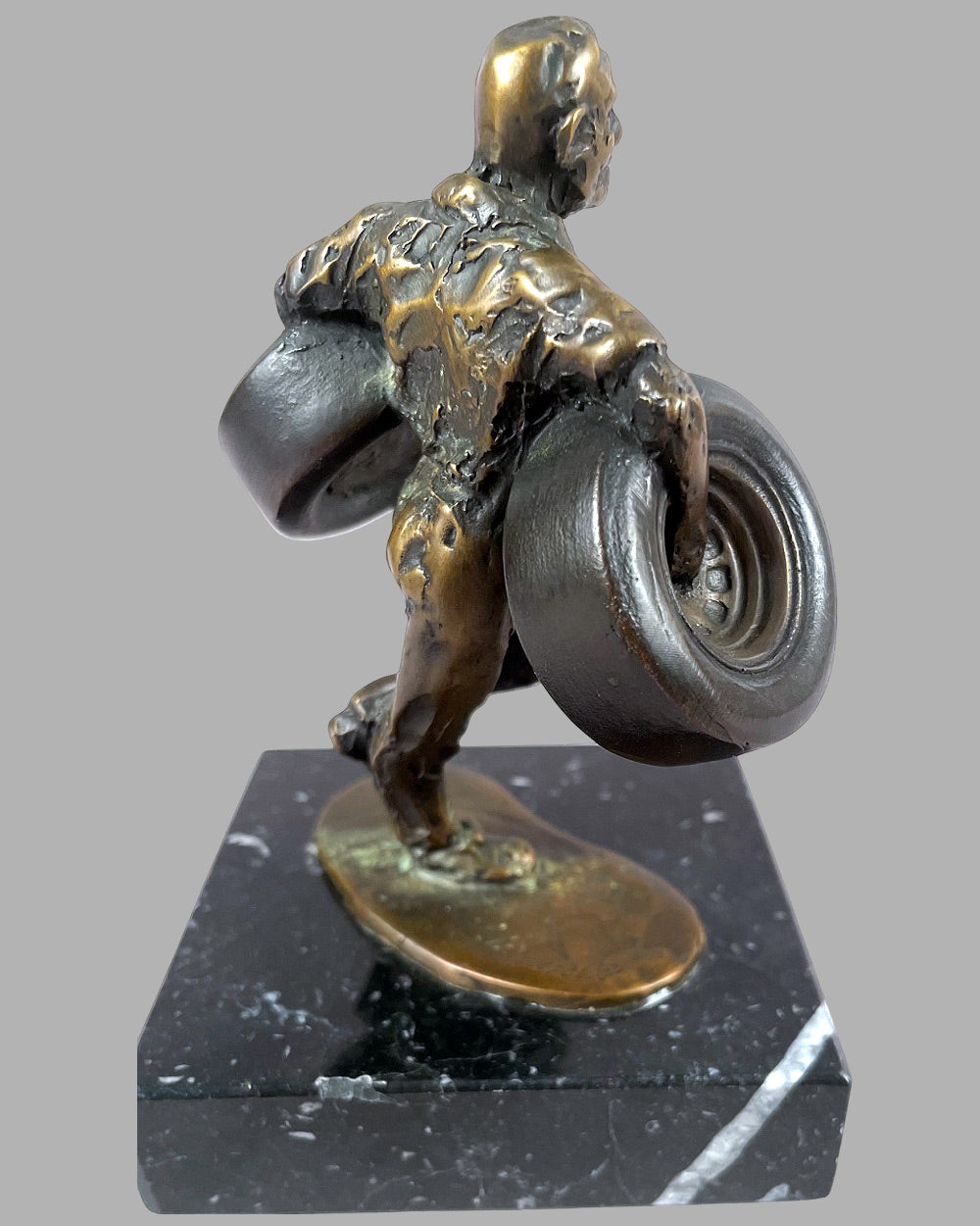 The Tire Changer bronze sculpture by Larry Braun, 1991 2