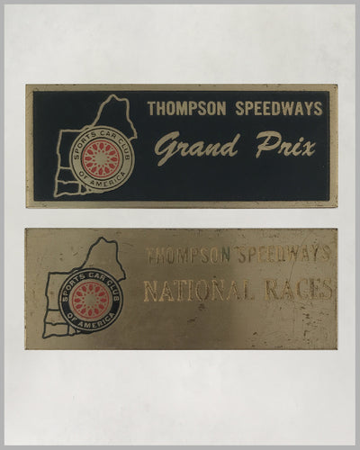 Two Thompson Speedways non-dated race participant’s dash plaques