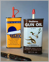 Four oil tin cans from Velox, Wynn’s, Esso, Outers 2