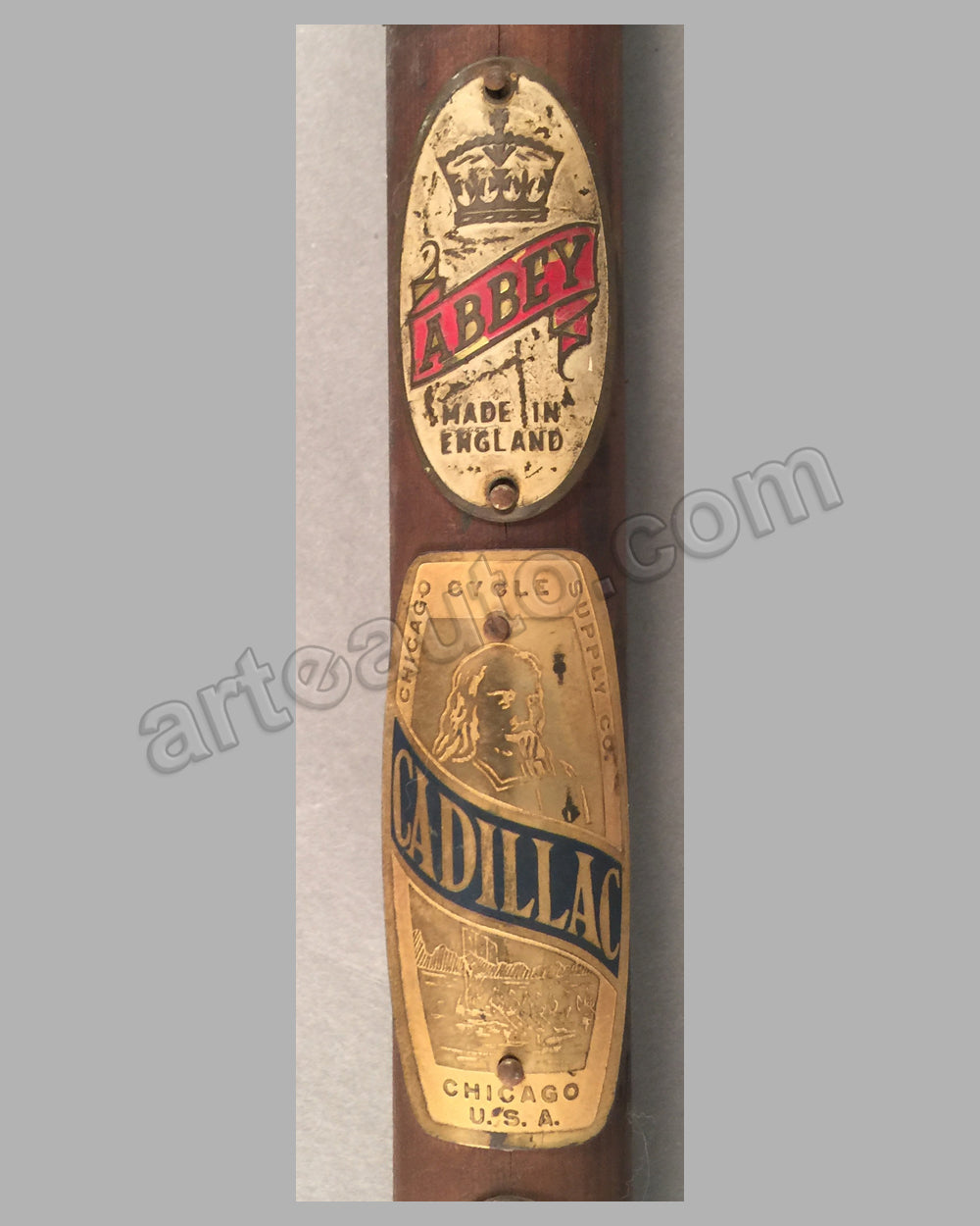 Bicycle Head Badge Collection (Lot of 8) on wooden dowel