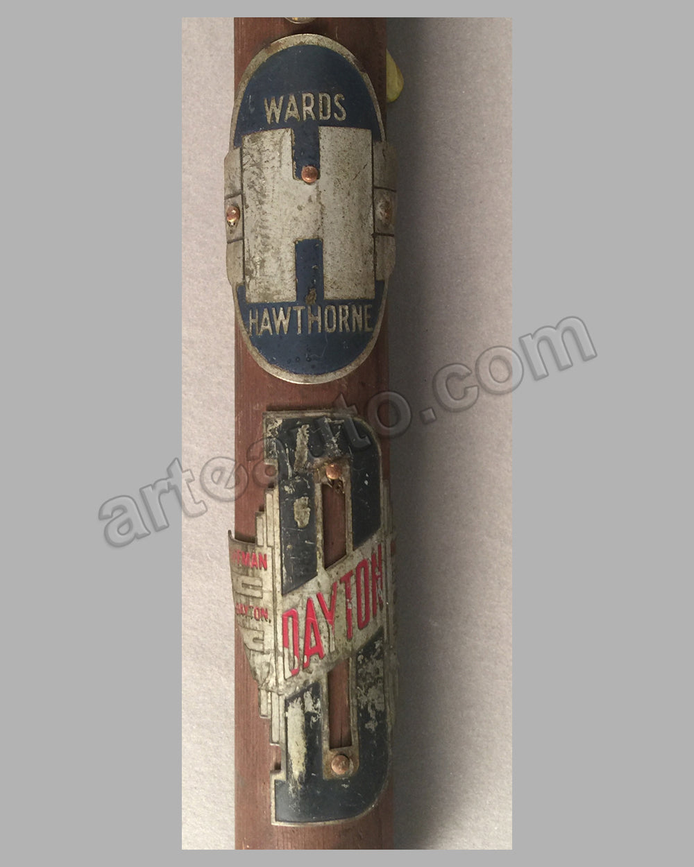 Bicycle Head Badge Collection (Lot of 8) on wooden dowel