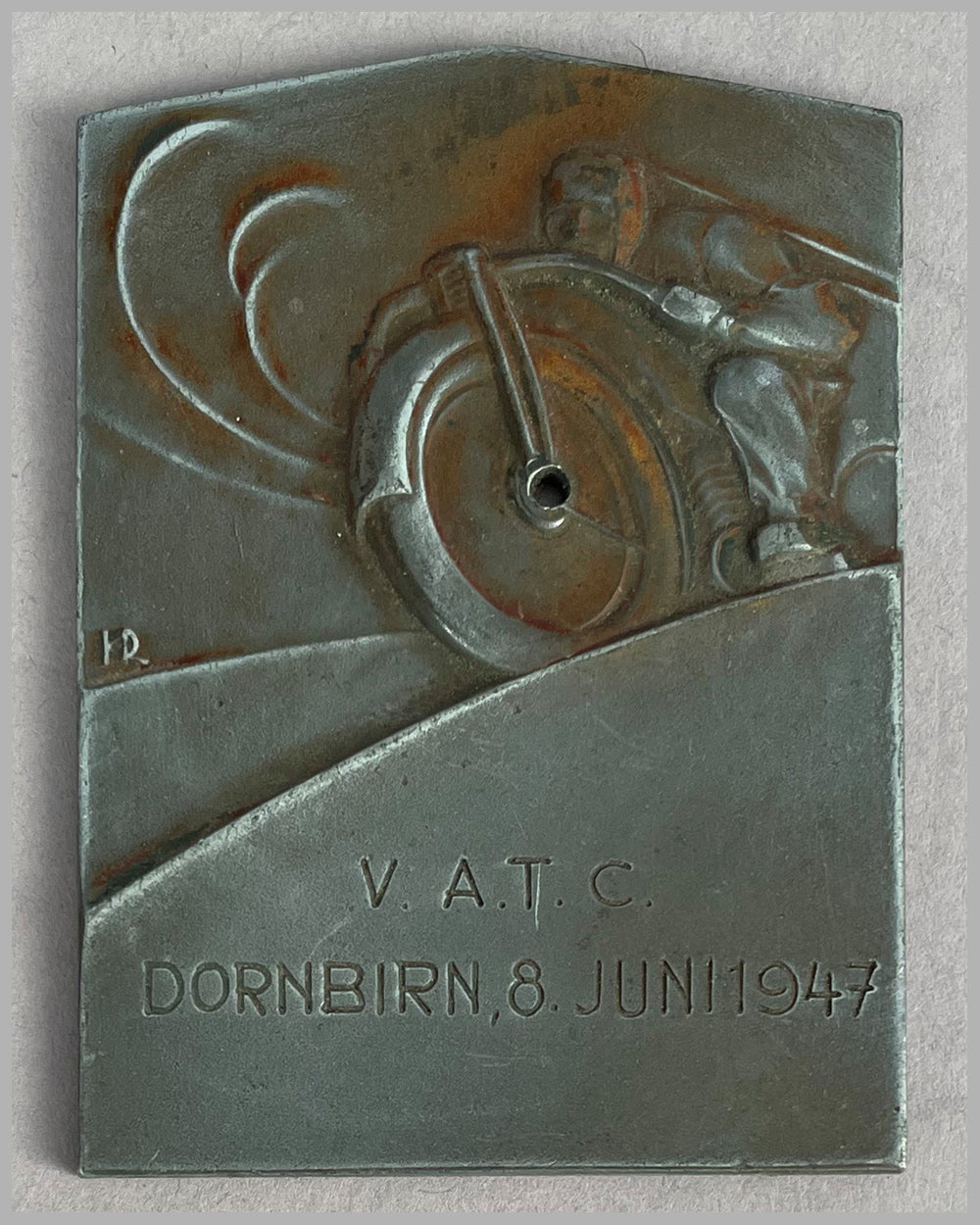 Participants dash plaque for the 1947 Dornbirn race