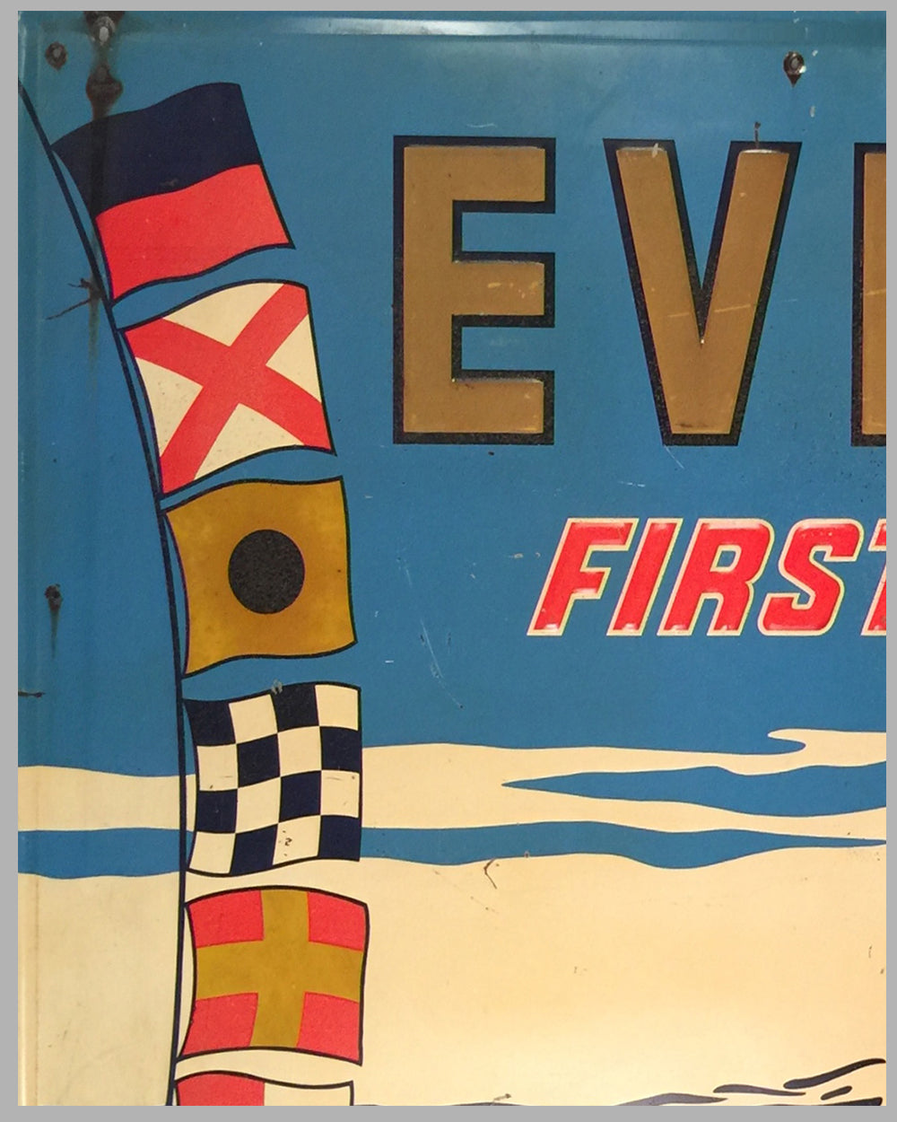 Large Evinrude painted metal embossed sign