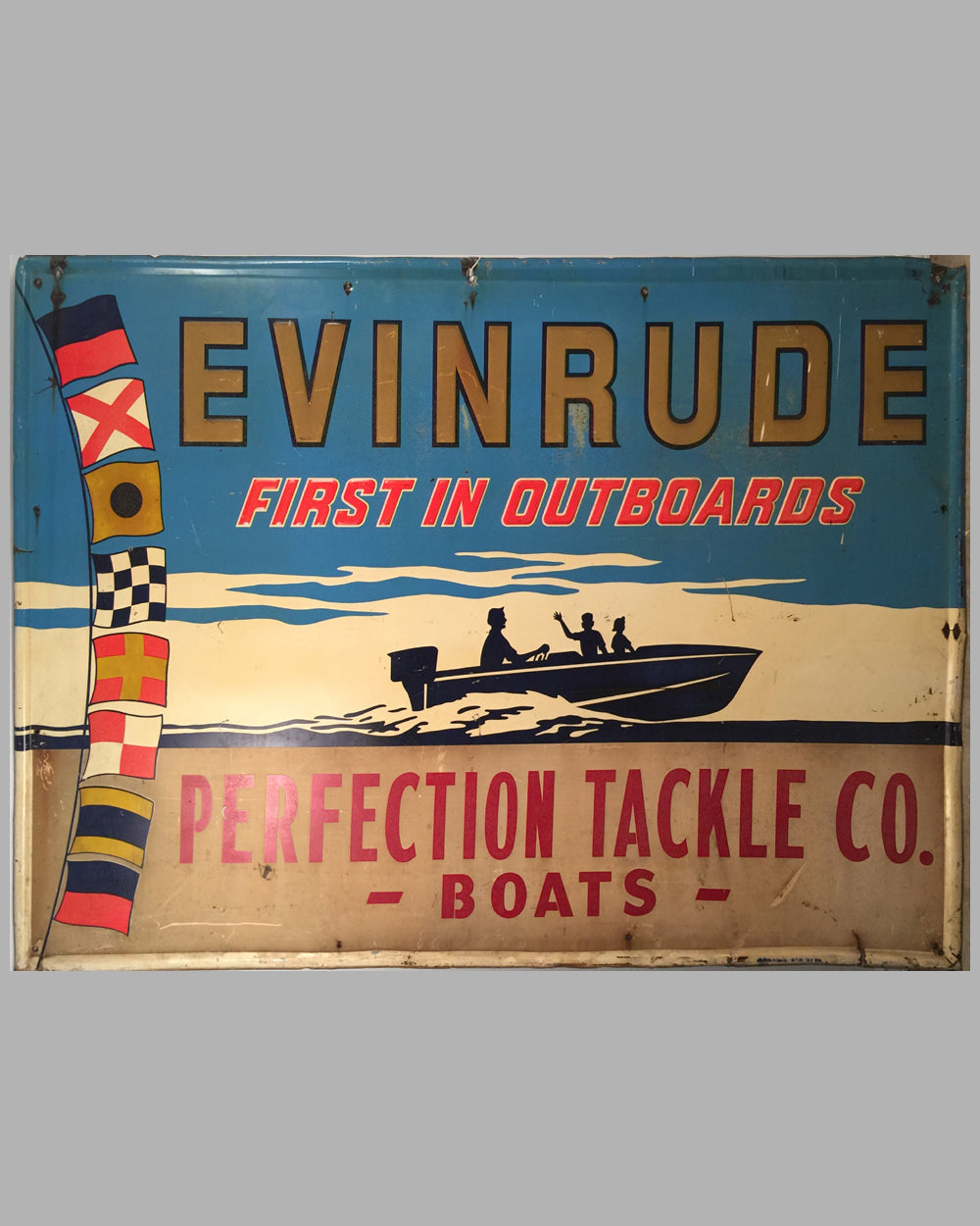 Large Evinrude painted metal embossed sign