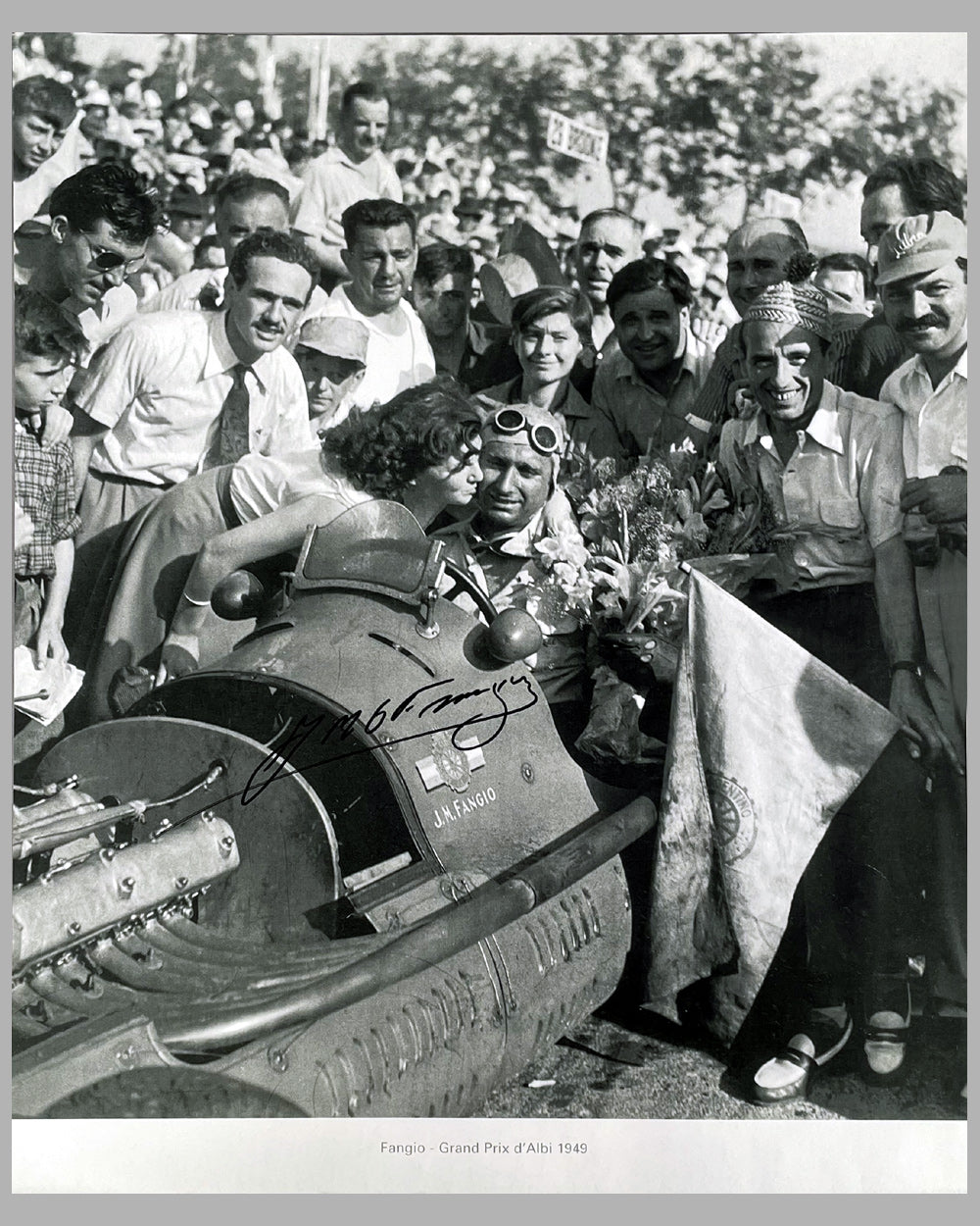 Juan Manuel Fangio winning the Grand Prix d&#39;Albi in 1949, hand autographed b&amp;w photo