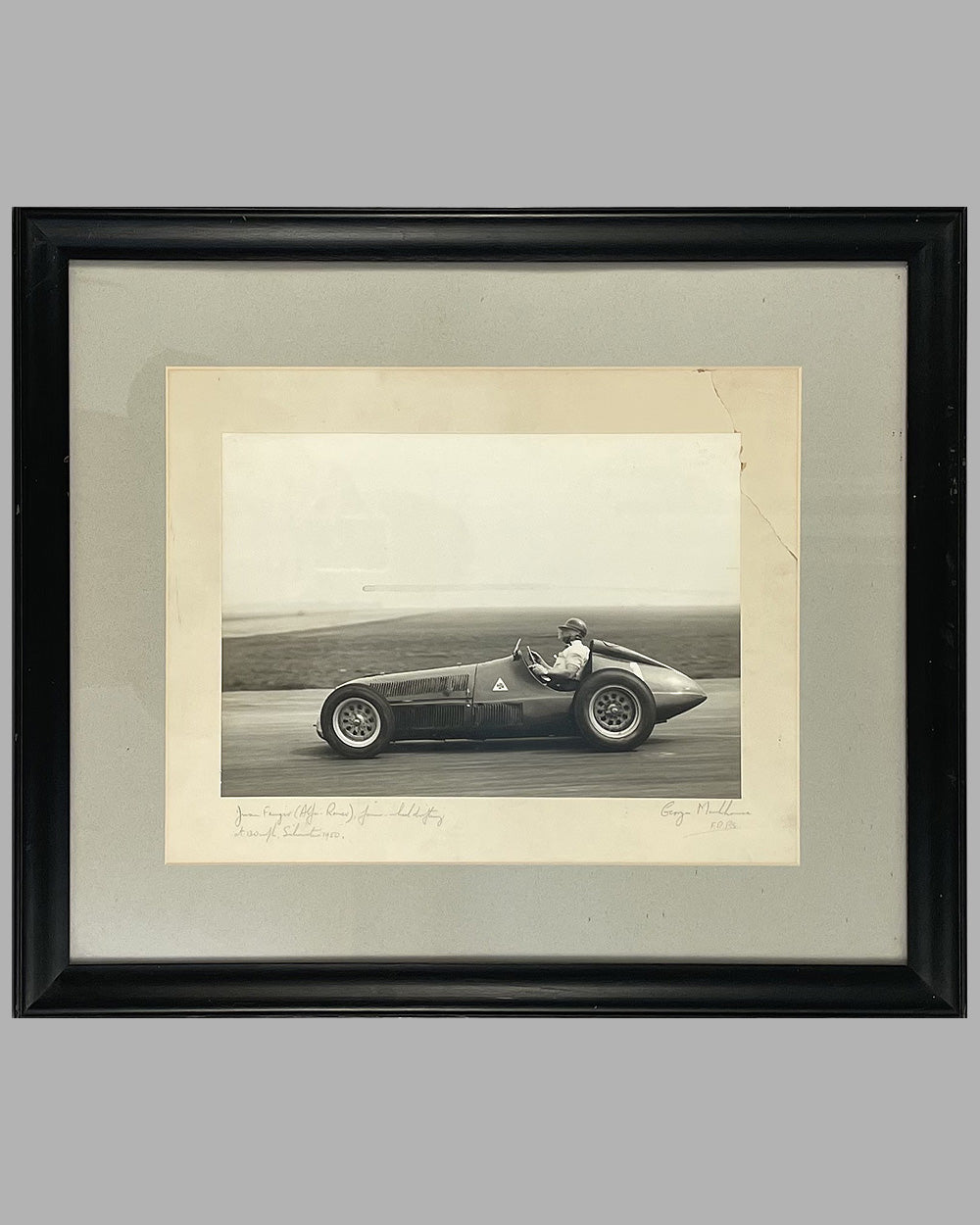 Juan Manuel Fangio&#39;s Alfa Romeo at the Silverstone G.P. in 1950