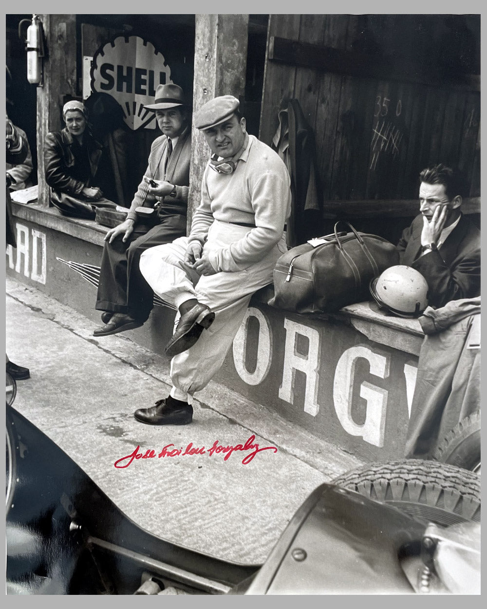 Jose Froilan Gonzalez in the pits, large b&amp;w autographed photo by Hans Muller