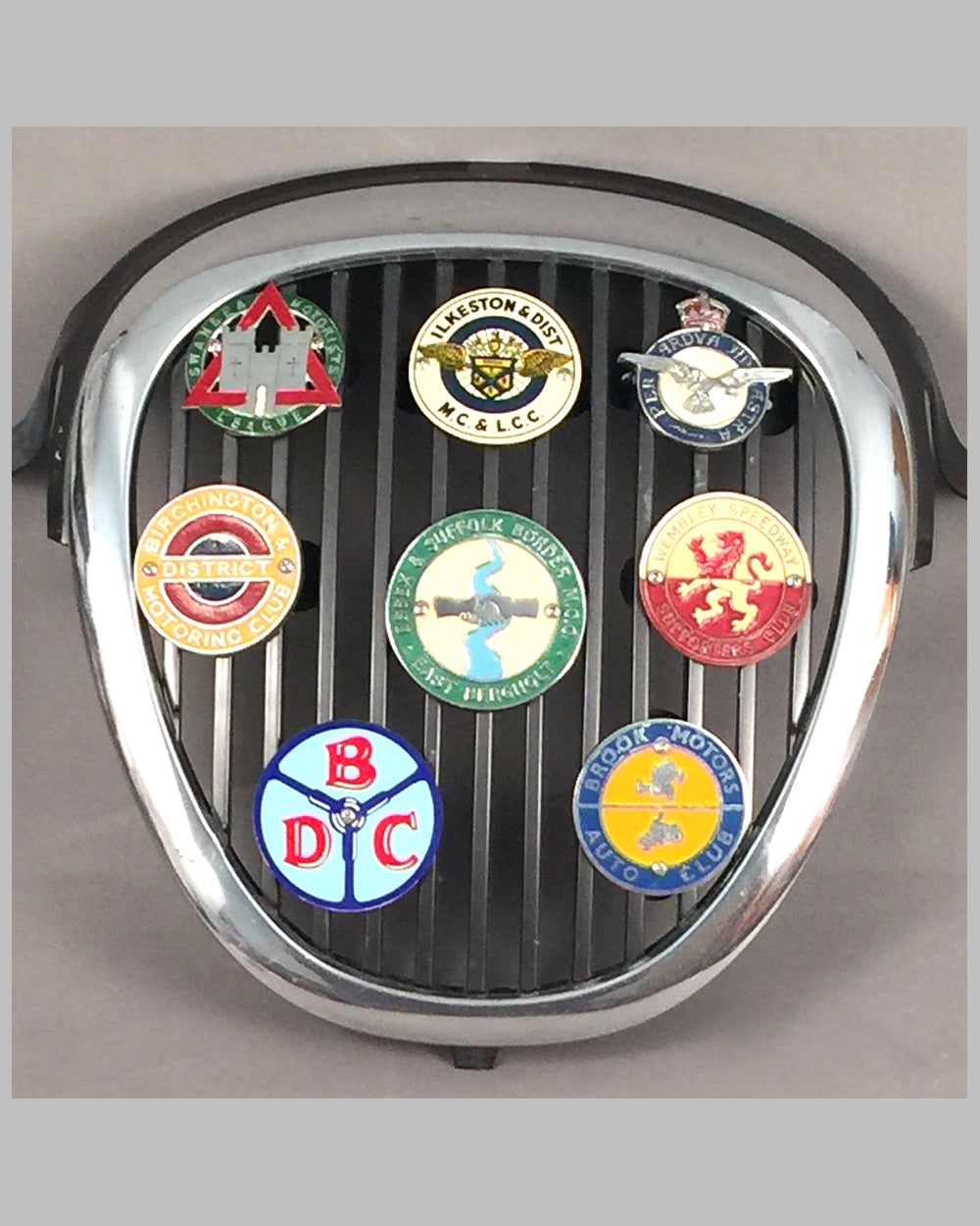 Jaguar S Type front grill with 8 British club badges displayed zoom