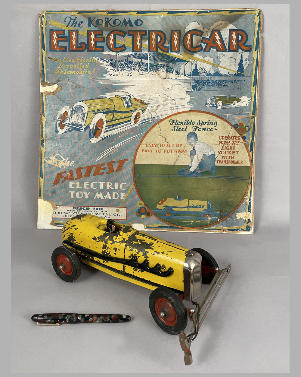 Kokomo Electricar race car and 2 sections of wired track (fence), early 1930's U.S.A.