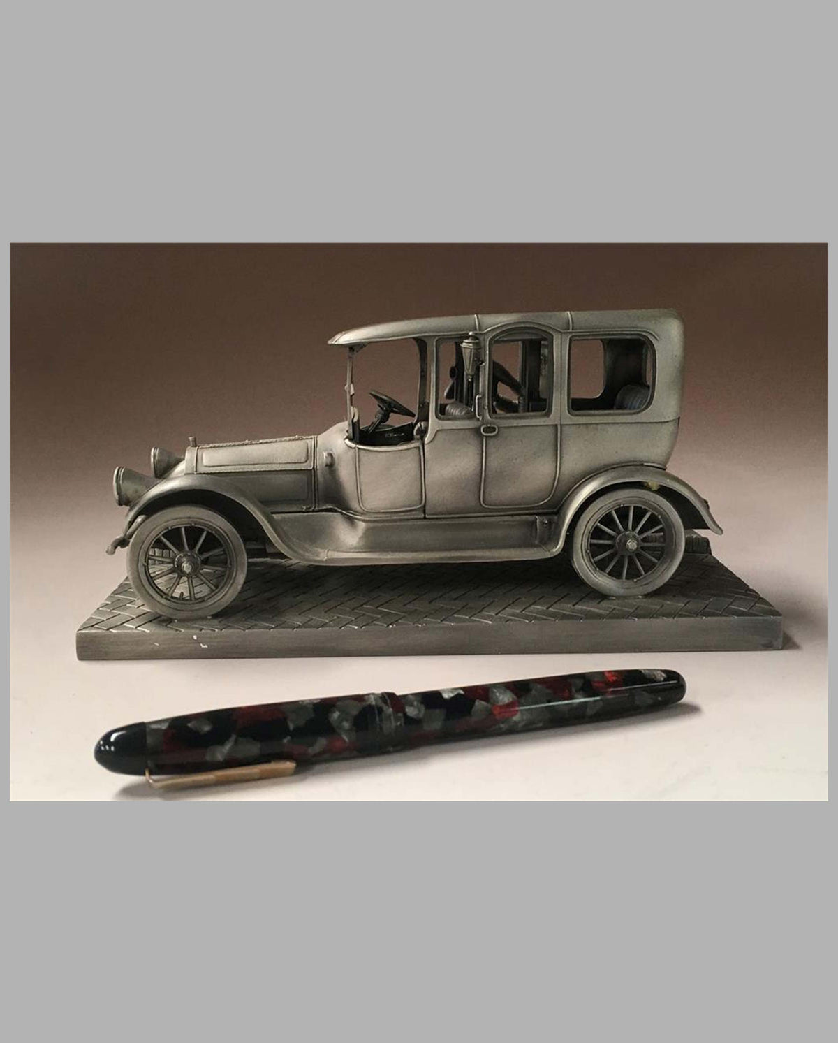 The Pierce Arrow Pewter Sculpture by Lionel Forrest, left side