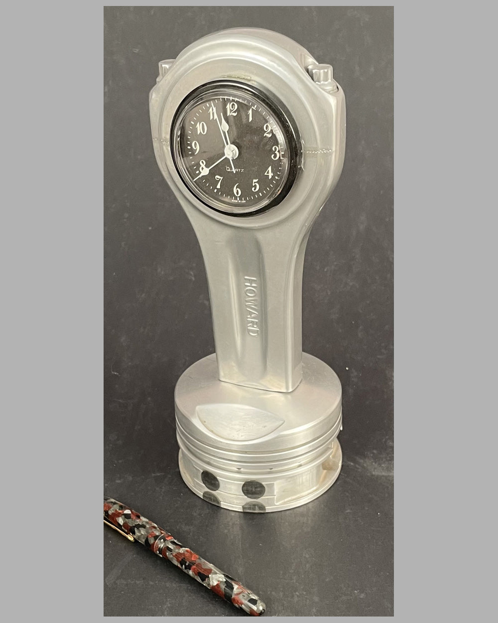 Rod and piston clock